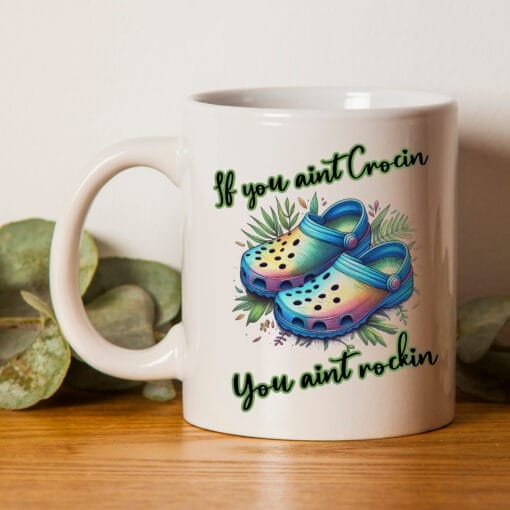 Funny crocs addict mug with the words if you ain't crocin you ain't rockin