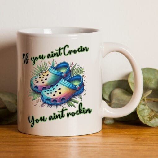Funny crocs addict mug with the words if you ain't crocin you ain't rockin